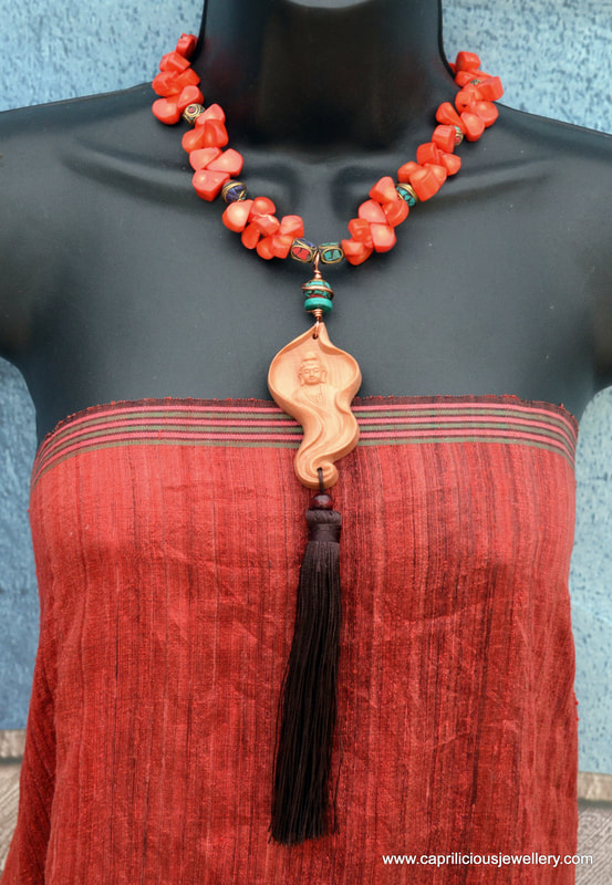 Kwan Yin pendant, bamboo coral necklace, orange coral necklace, tassel jewellery