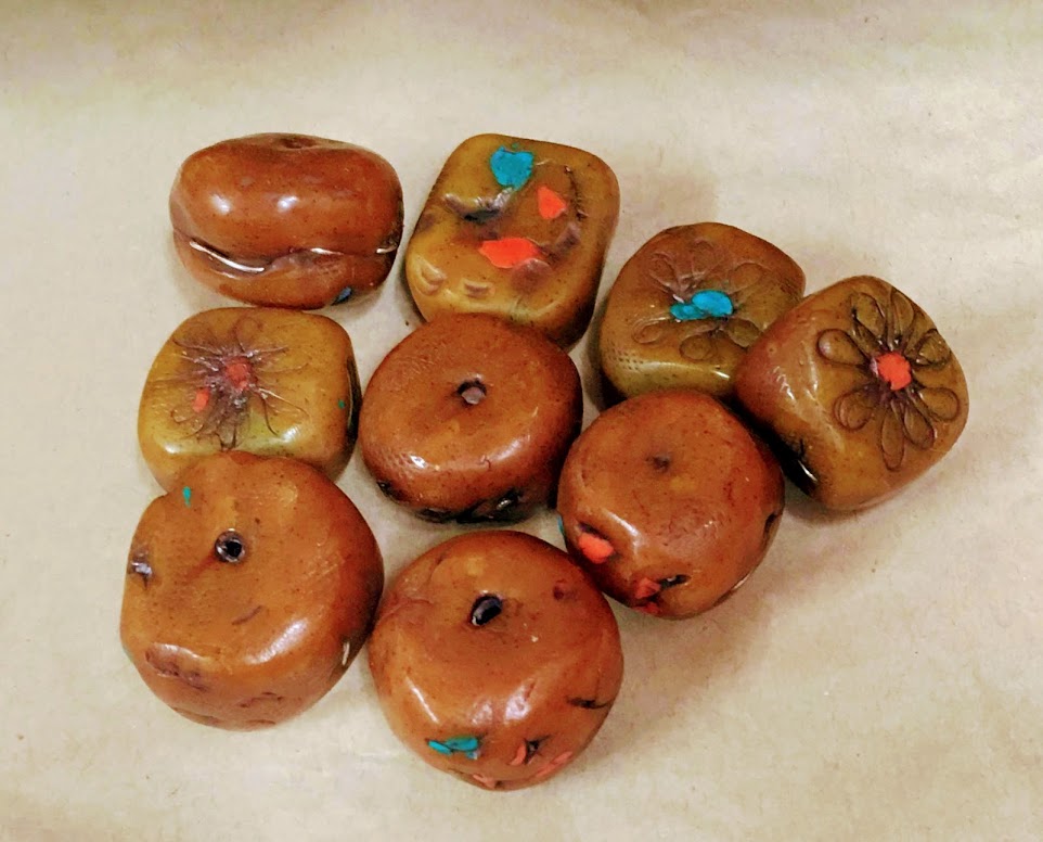 Polymer clay faux amber beads made by Caprilicious Jewellery