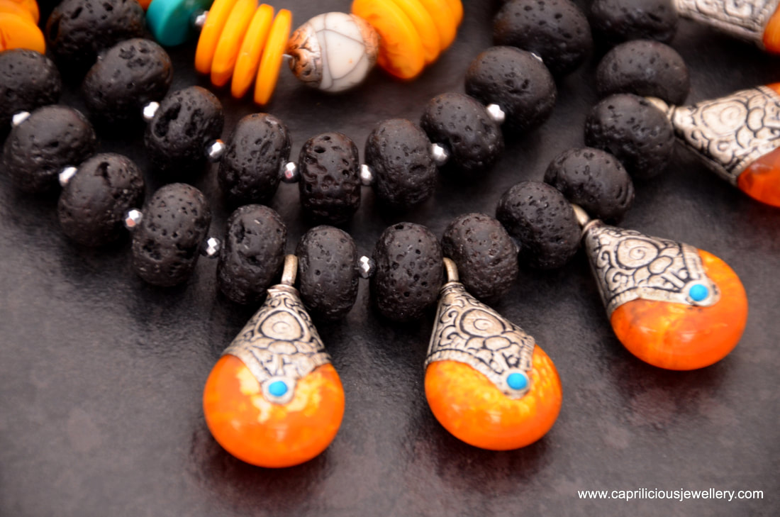 lava stones, lava beads, multistrand necklace, beeswax amber, Tibetan beads, chank shell beads, 