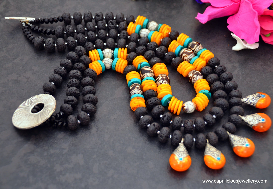 lava stones, lava beads, multistrand necklace, beeswax amber, Tibetan beads, chank shell beads, 