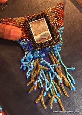 Seascape - A beaded work in progress with an Intarsia focal by Caprilicious Jewellery