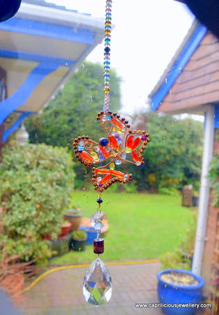 Butterfly suncatcher with wire, crystals and beads by Caprilicious Jewellery